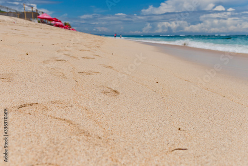 Footprints on the sand in the Pandawa beach. Bali  Indonesia.