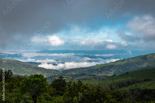 mountain coverd with cloud layers and beautiful sky