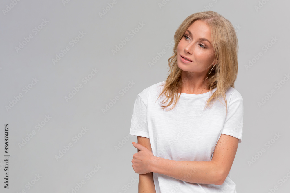 Portrait of a beautiful young woman thinking, isolated on white background Portrait of a beautiful young woman thinking, isolated on white background