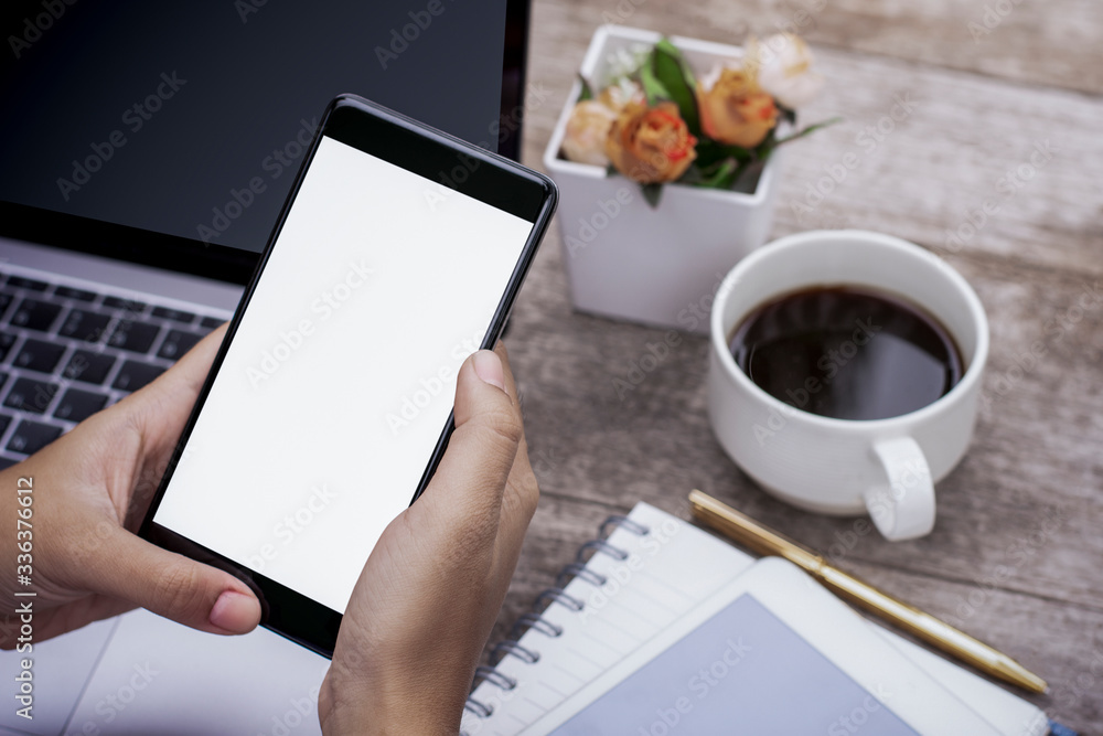 businesswoman working on tablet computer and phone. businesswoman working on tablet computer and phone.