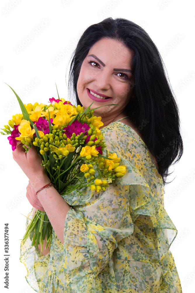 Beautiful woman holding fresh freesia bouquet Beautiful woman holding fresh freesia bouquet