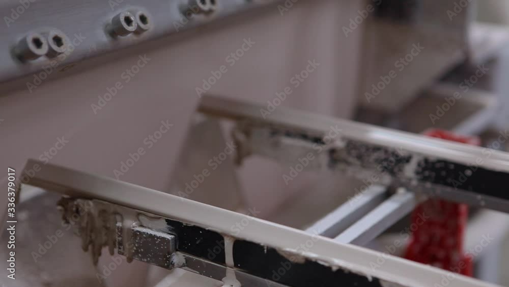 Making ceramic tiles in a modern factory. Making ceramic tiles in a modern factory.