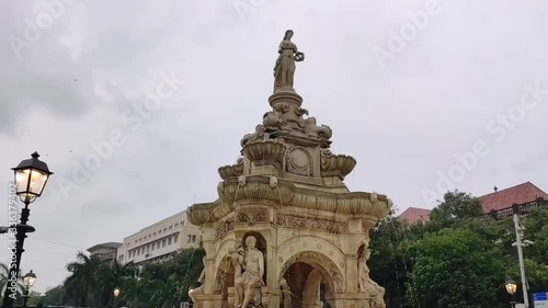 Flora Fountain - Flora Fountain is at the Hutatma Chowk, South Mumbai, Maharashtra, India. Hyperlapse video of Flora Fountain in a rainy day. photo