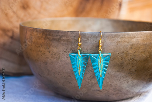 Bohemian feather turquoise earrings. Handmade jewelry design. © Etnika