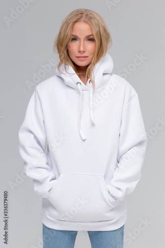 Woman in white hoodie, mockup for logo or branding design