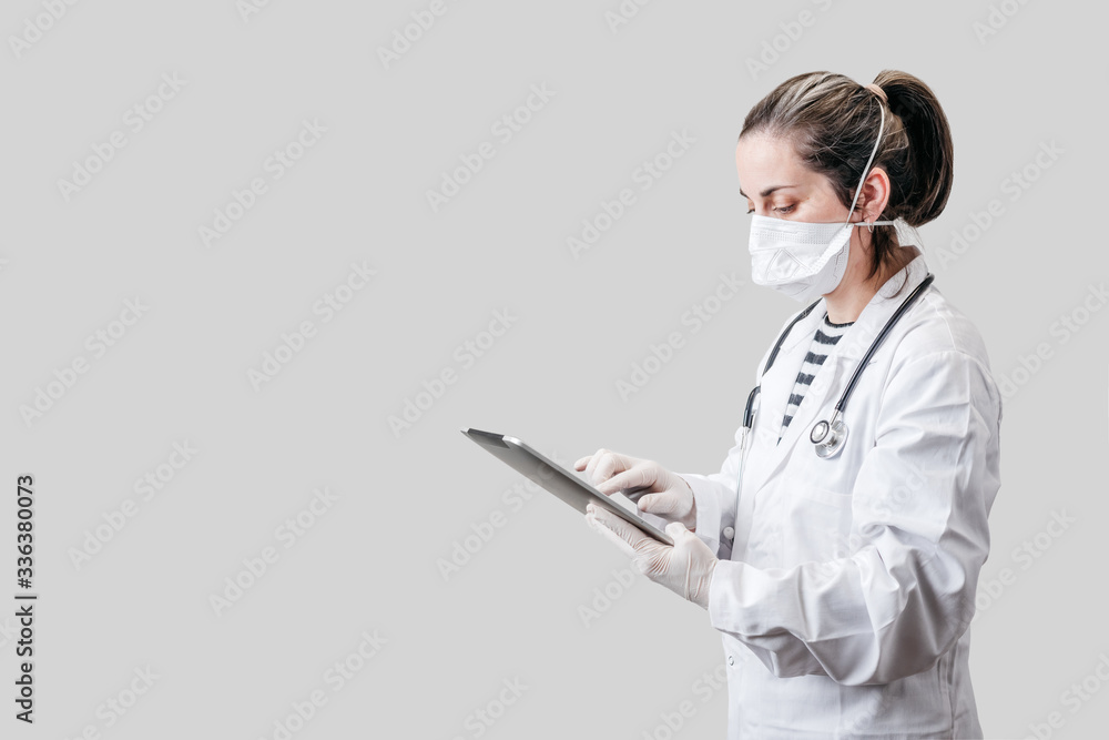 doctor holding a tablet on a white background doctor holding a tablet on a white background