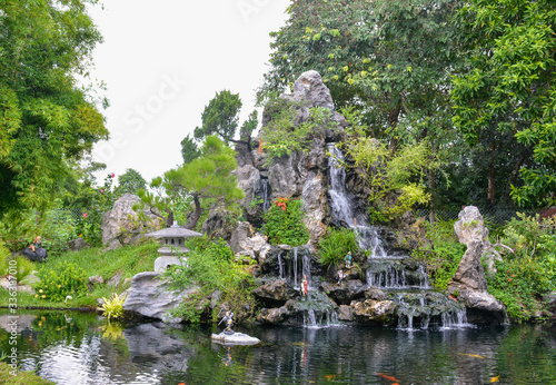 Pond with waterfalls in the Thien Mu Pagoda or Pagoda of the Celestial Lady. Hue, Vietnam
