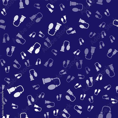 White Penis pump icon isolated seamless pattern on blue background. Penis enlarger. Sex toy for men. Vacuum pump with a blower to increase the penis. Vector Illustration