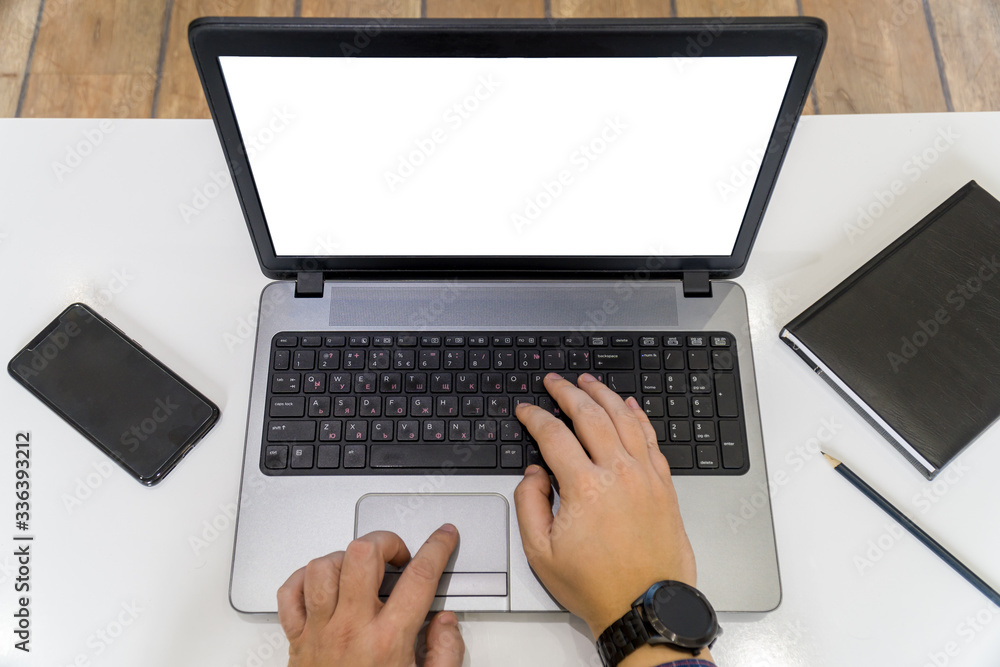 Wroking from home concept with hands typing on a laptop Wroking from home concept with hands typing on a laptop