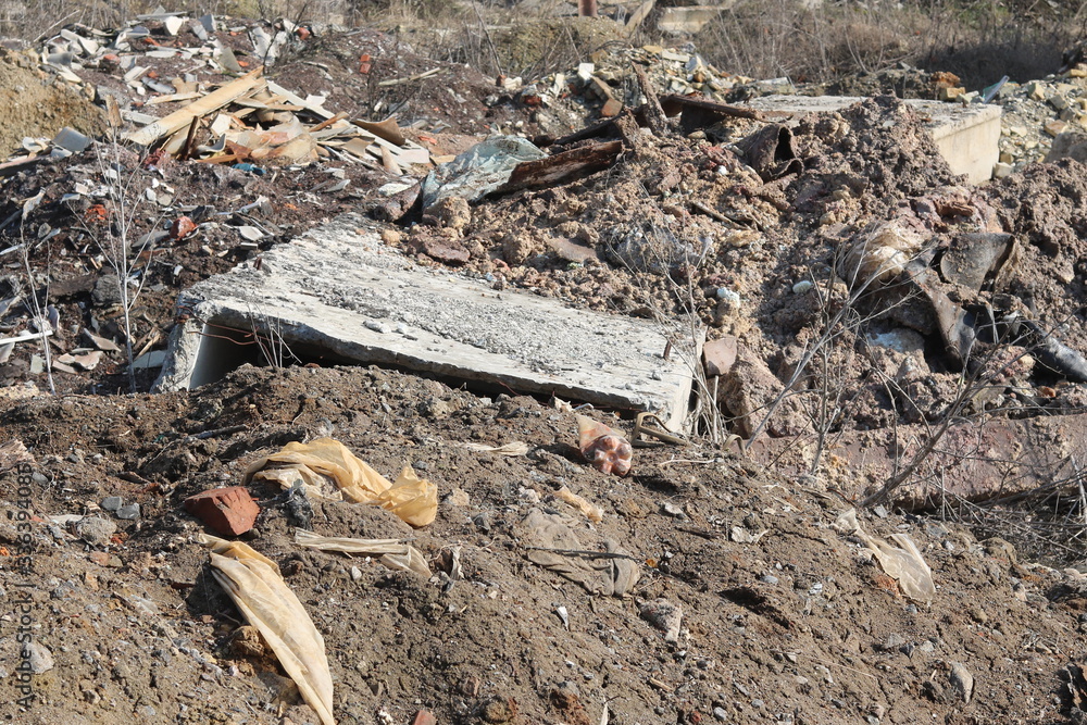 Construction waste with elements of and destroyed old structures at municipal landfill Construction waste with elements of and destroyed old structures at municipal landfill
