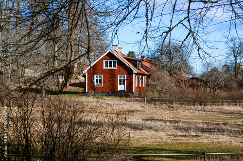Swedish red house in the countryside © Caterina