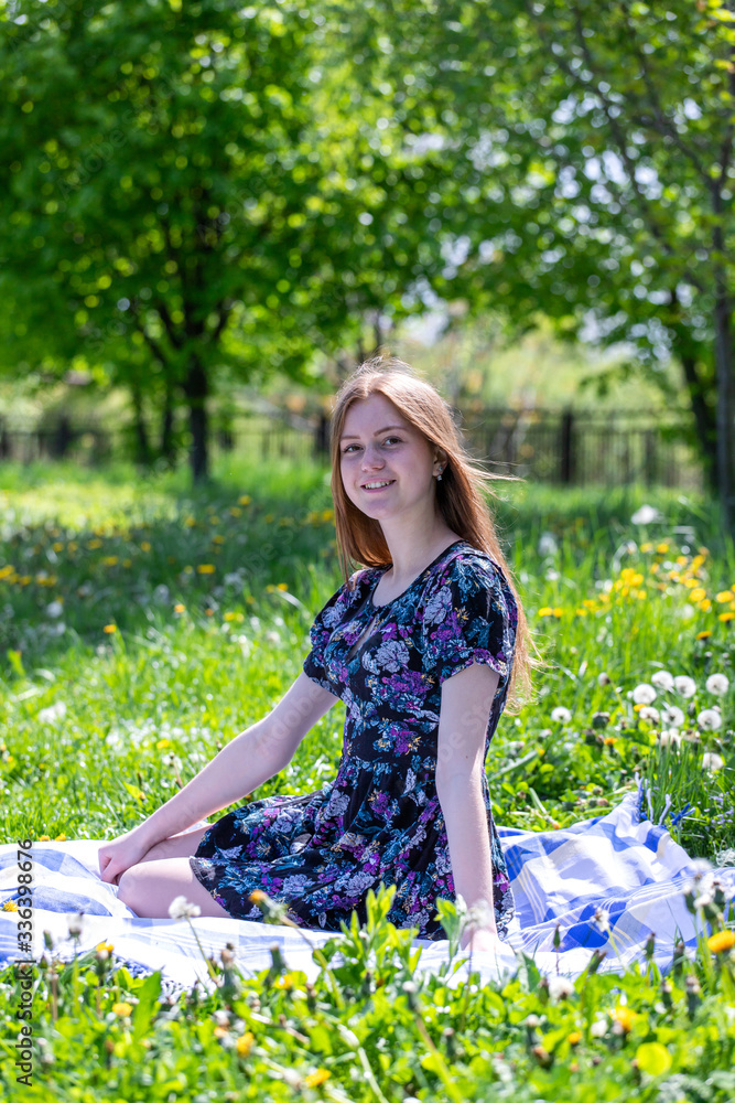 Beautiful and young girl resting on the nature. Beautiful and young girl resting on the nature.