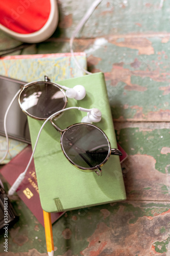 Traveler's accessories, Essential vacation items, Travel concept background. Planning a vacation trip. Selective focus