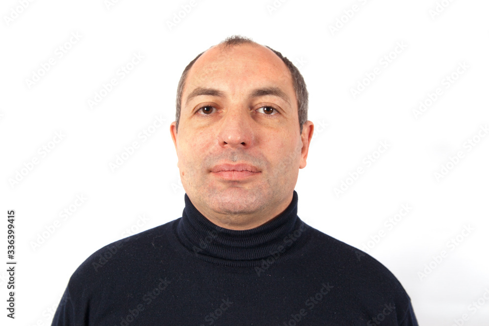 Portrait of calm young man dressed in black jacket. Isolated on white Portrait of calm young man dressed in black jacket. Isolated on white