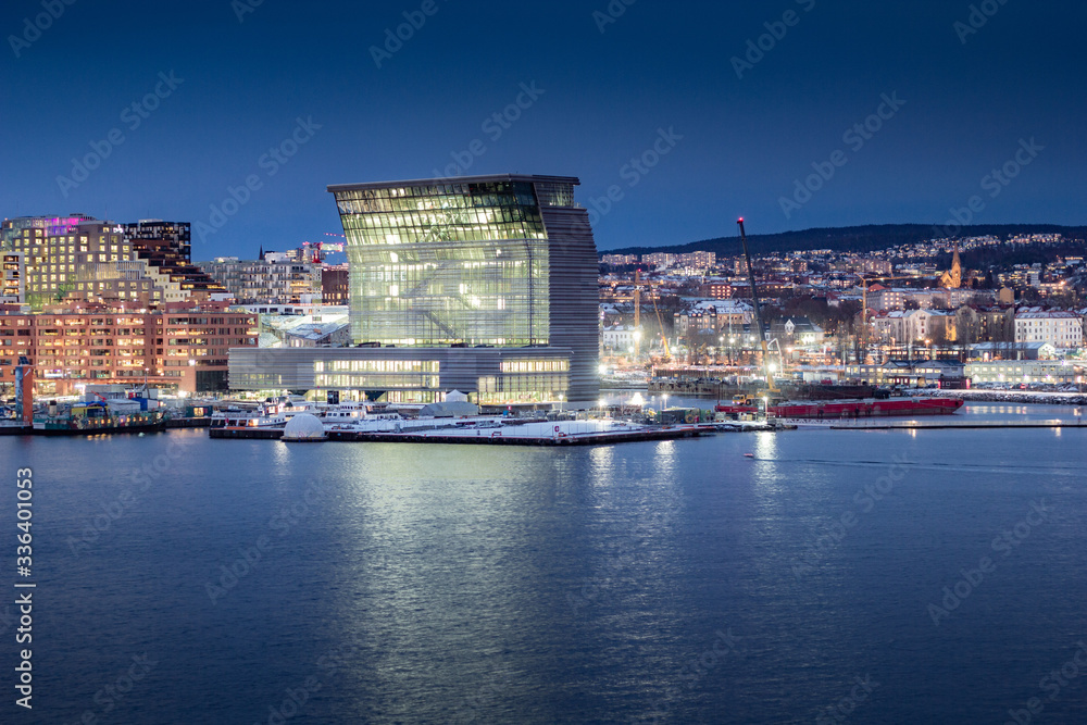 City at night with street lights and lit buildings in Oslo, Norway