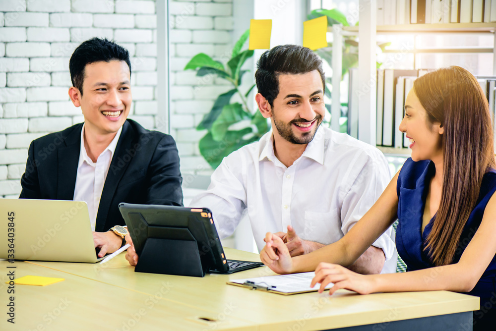 Fototapeta premium Business team meeting or brainstorming and discussing with financial data and analyzing report graph at office. Teamwork meeting and partnership conference working concept.
