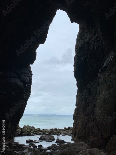 looking out from a cave onto the sea