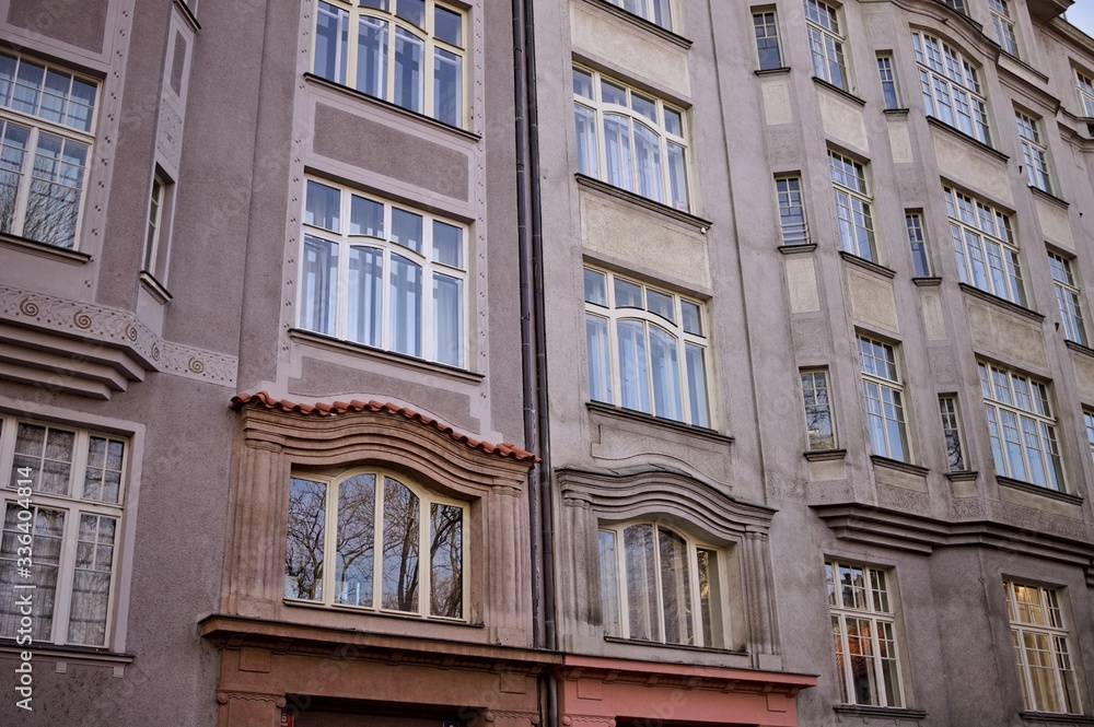 Vintage facade of a building with a lot of windows (Prague, Czech Republic, Europe)