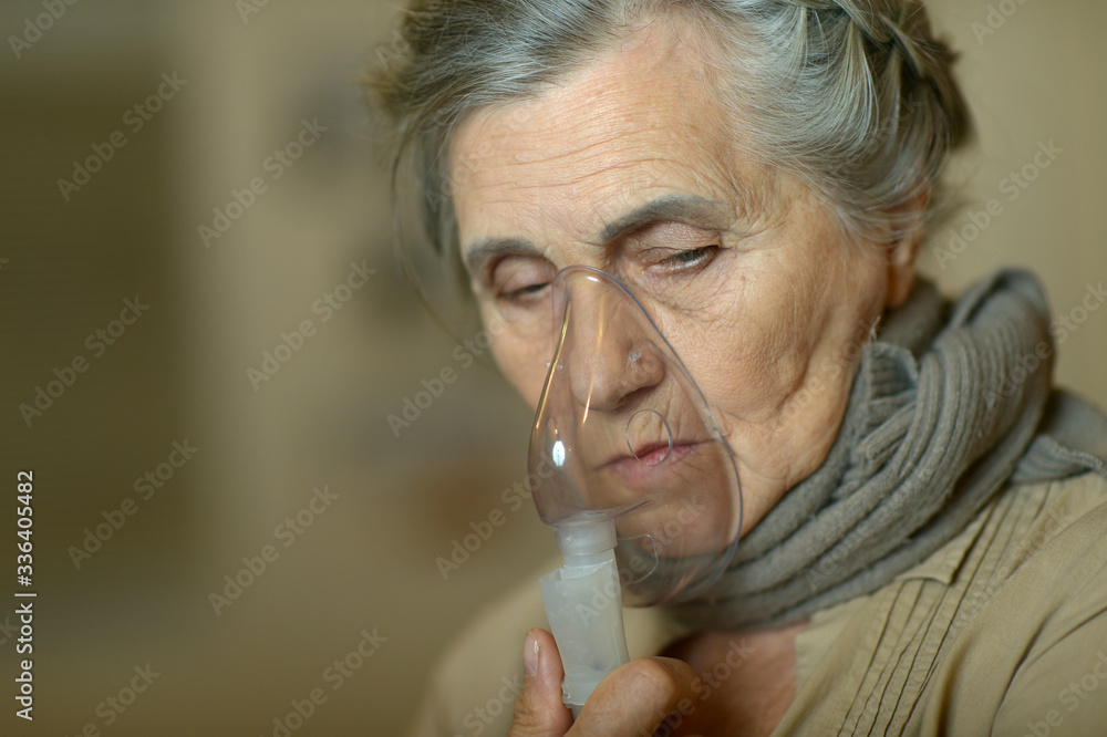 Portrait of elderly woman with flu inhalation Portrait of elderly woman with flu inhalation