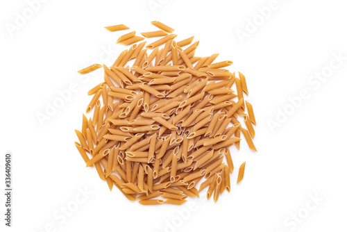 Whole grain pennette rigate pasta isolated over white. Clipping path at 300%