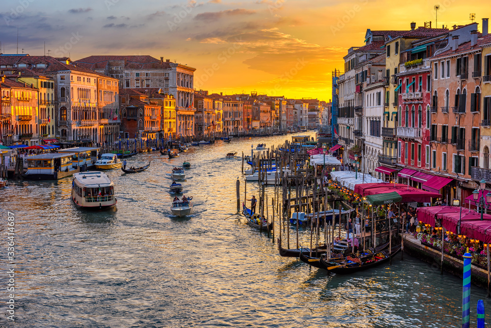 Grand Canal with gondolas in Venice, Italy. Sunset view of Venice Grand Canal. Architecture and landmarks of Venice. Venice postcard - obrazy, fototapety, plakaty 