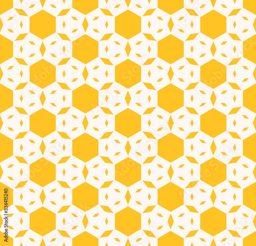 Yellow geometric seamless pattern. Vector abstract texture with hexagons, small rhombuses, floral figures. Background in bright colors. Positive summer design for decoration, textile, fabric, cloth