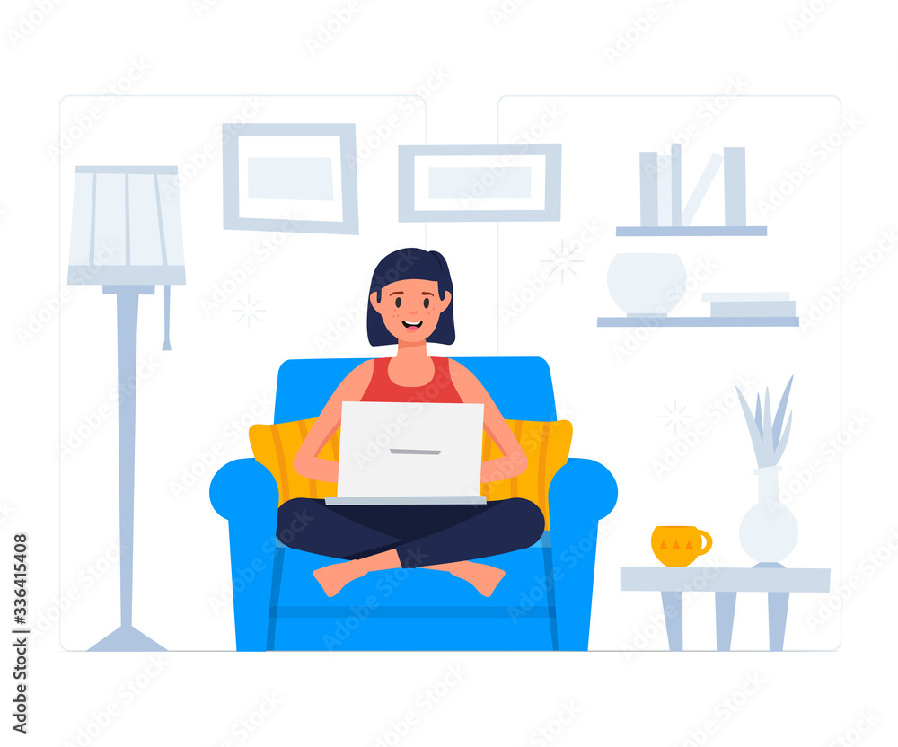 Stay at home concept. Woman working on the laptop. Girl sitting at armchair