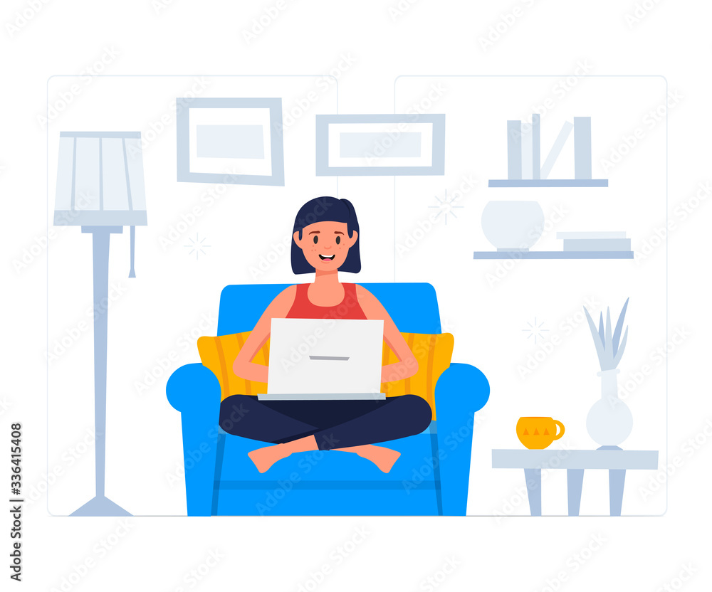 Stay at home concept. Woman working on the laptop. Girl sitting at armchair Stay at home concept. Woman working on the laptop. Girl sitting at armchair