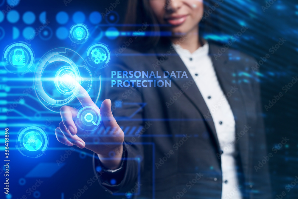 Fototapeta premium Business, Technology, Internet and network concept. Young businessman working on a virtual screen of the future and sees the inscription: Personal data protection