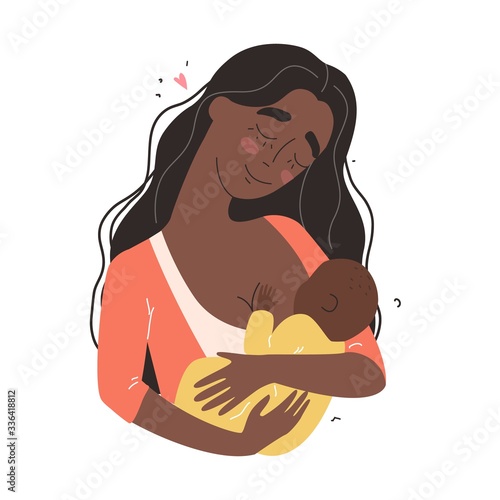 Beautiful young black mother breastfeeds her baby. A woman hugs a baby and feeds it with breast milk.