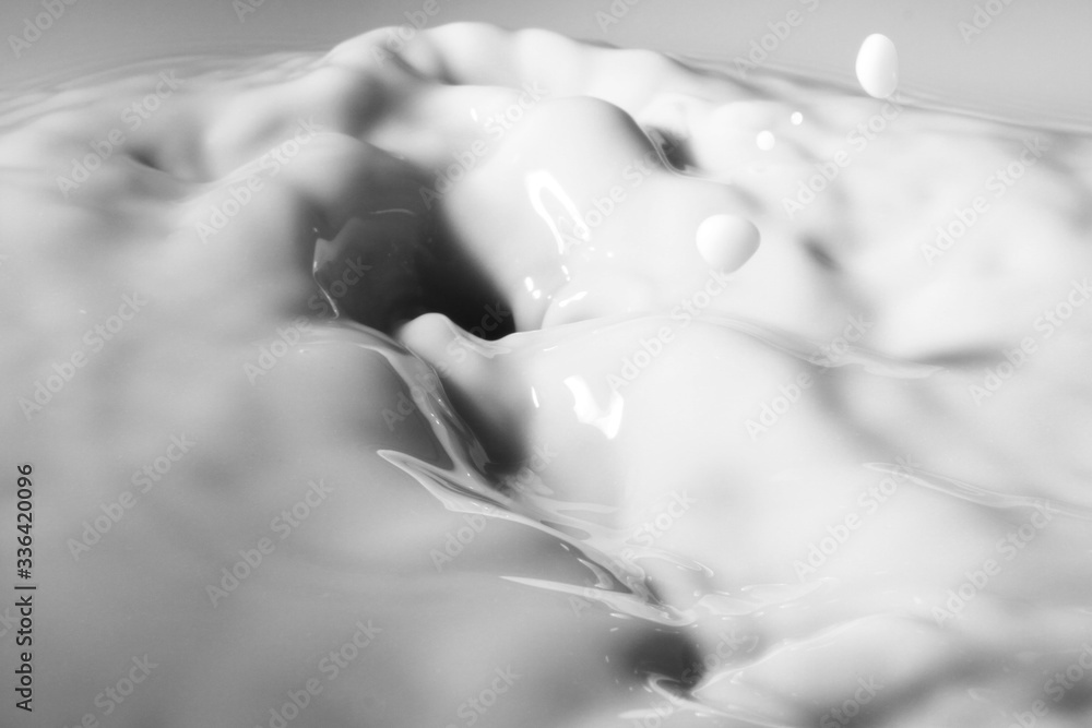 Splash of white liquid or milk