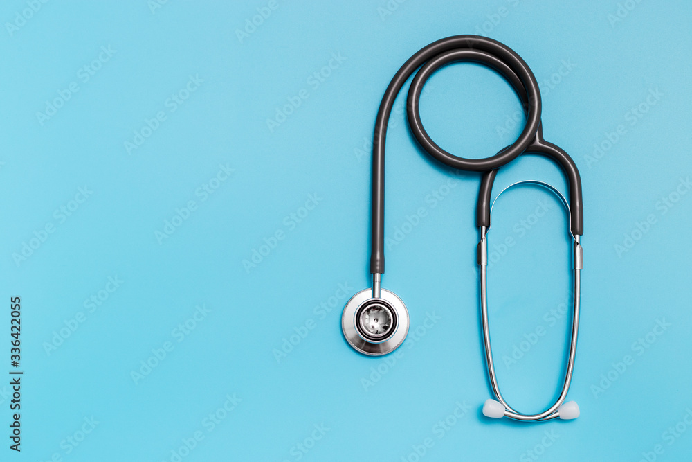 Medical equipment stethoscope on blue background. Medical equipment stethoscope on blue background.