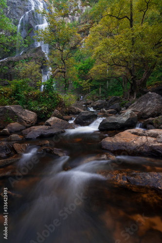  Waterfall in autumn forest at Erawan National Park  Thailand