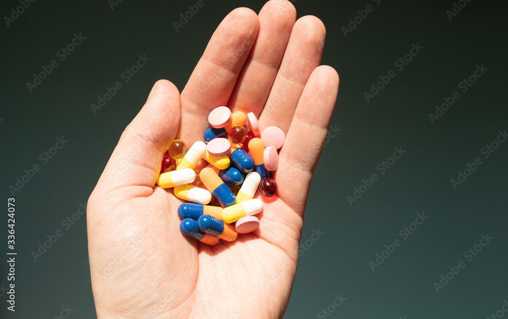 Colorful pills and medicines in the hand. Colorful pills and medicines in the hand.