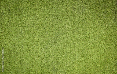 Artificial green grass texture background. © Keaw