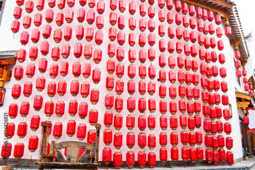 Red lanterns on the wall photo