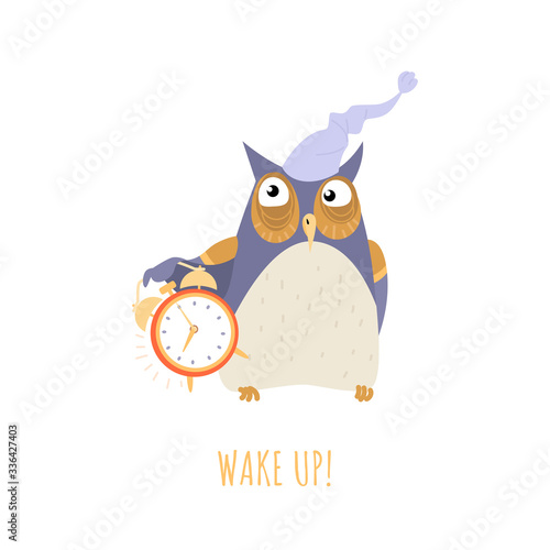 Wake up concept with a cute cartoon owl in a nightcap and with an alarm clock isolated on white background