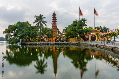 HANOI, VIETNAM, 4 JANUARY 2020: Beautiful sunset over the Tran Quoc Pagoda of Hanoi