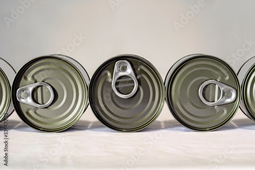 cans of perishable food canning on white table