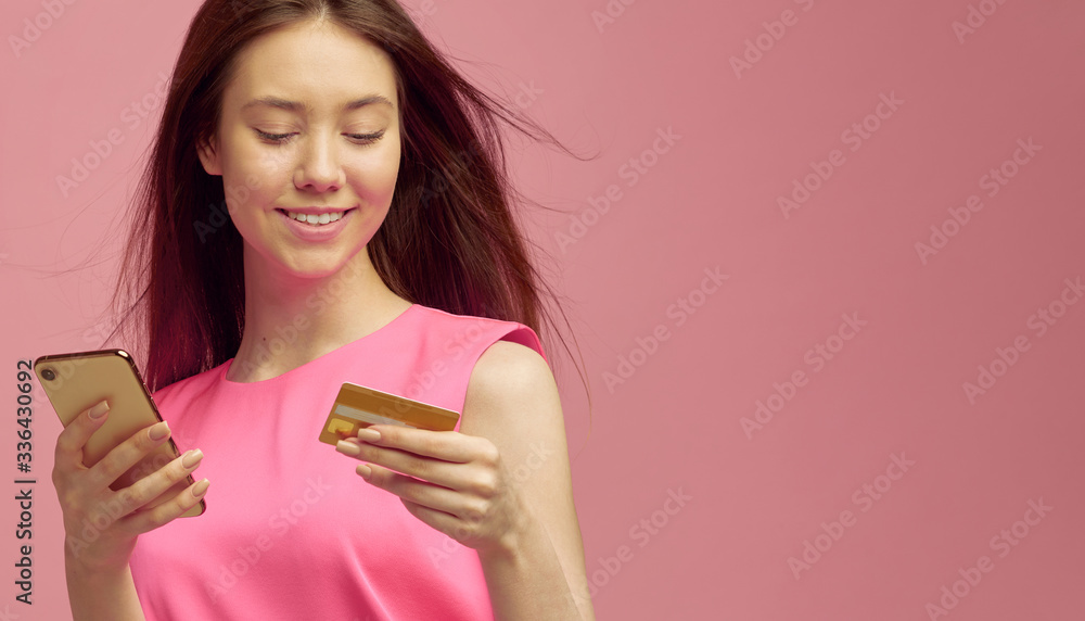 Cute blond girl receive cool cash back or banking, online shopping offer after using new credit card with student offer. Cute blond girl receive cool cash back or banking, online shopping offer after using new credit card with student offer.