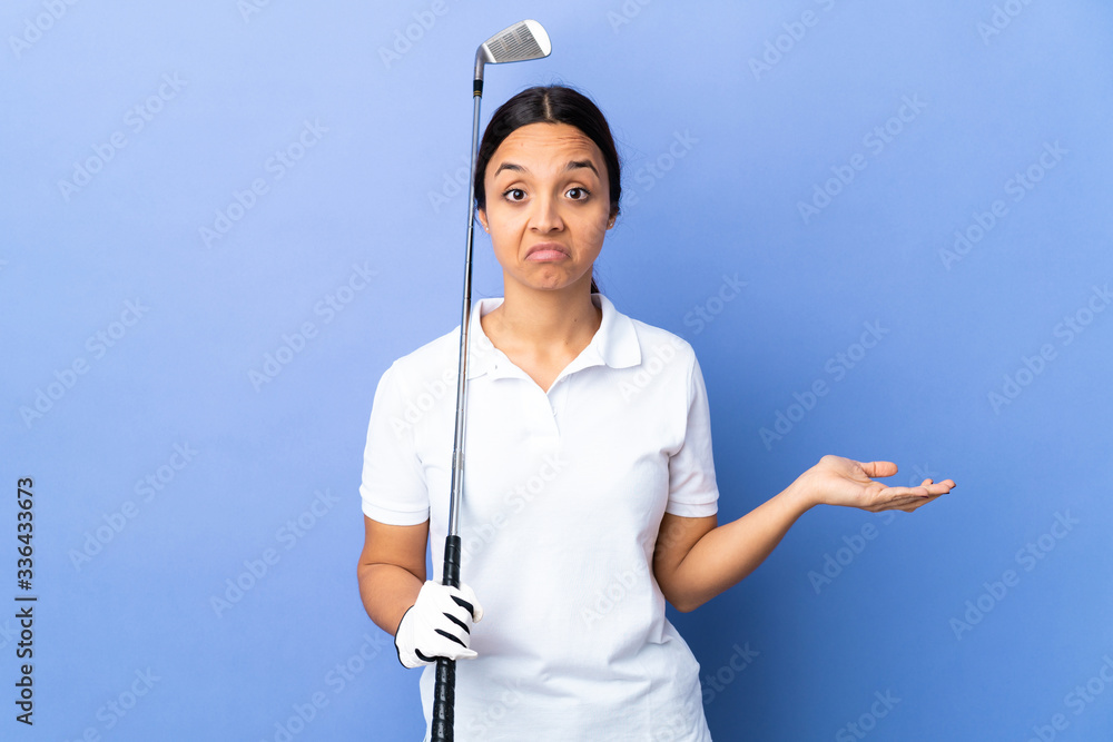Young golfer woman over isolated colorful background having doubts while raising hands Young golfer woman over isolated colorful background having doubts while raising hands