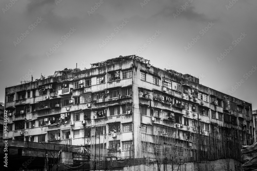 GUANGZHOU, CHINA, 18 NOVEMBER 2019: Crumbling, old and ugly building in Guangzhou