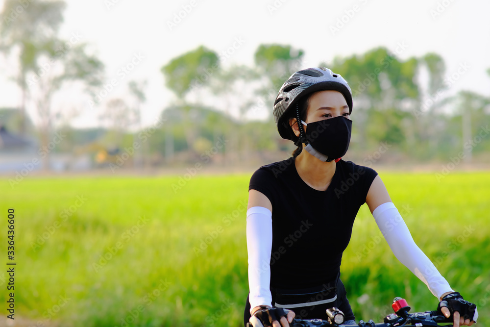 sporty woman riding a mountain bike in the natural background sporty woman riding a mountain bike in the natural background