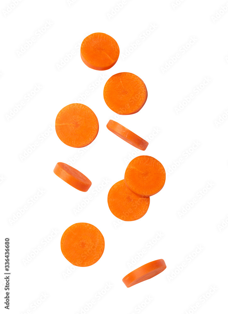 Falling carrot slice isolated on white background with clipping path.
