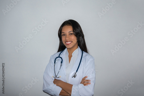 A pretty young Colombian doctor or adult nurse