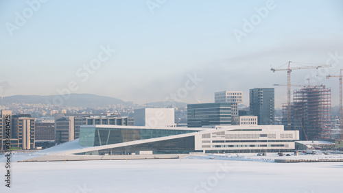 People walking on the opera house in Oslo