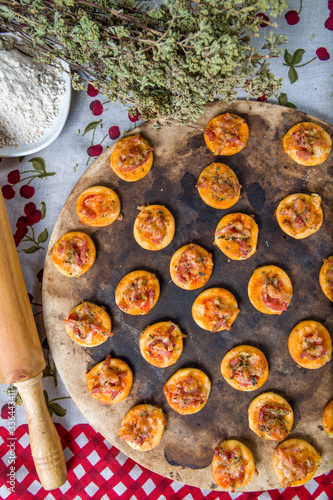Mini pizzas and rolling pin