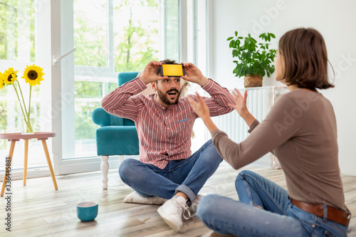 Couple playing a word guessing game