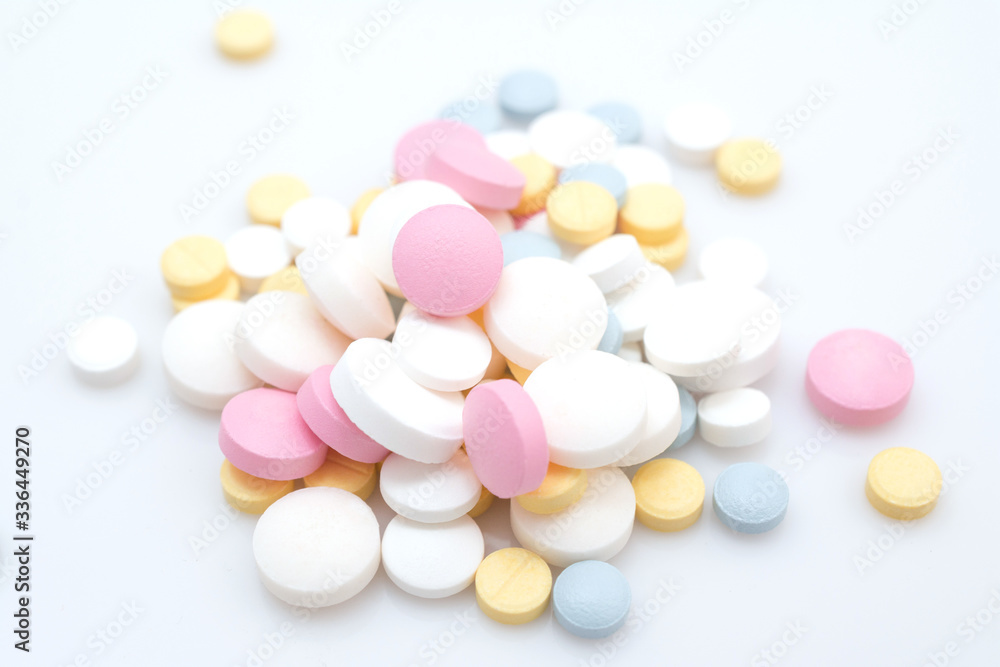 coronavirus treatment with pills concept, slide of colored pills