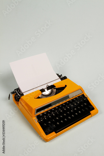 Mechanical portable typewriter made in 1980. 1980 portable typewriter made of metal and lead material.